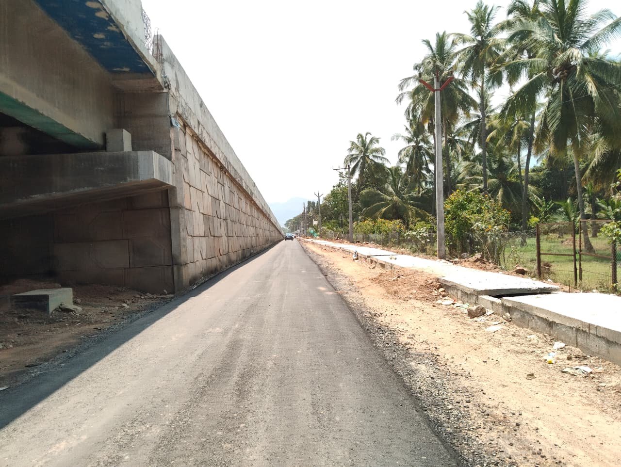 Construction of ROB at Km. 93/417 (Railway Km. 89/6-7) of NH 49 Extn (New NH No 85) in lieu of LC Madurai – Cochin Road, between Theni – Bodi railway stations under Sethubharatham Project on EPC basis contract | KMC Construction Company, Civil Contractor Theni, Tamil Nadu